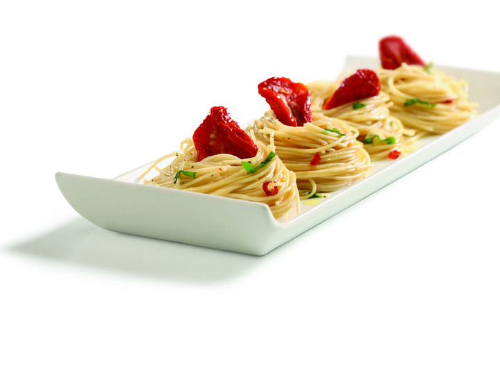 Spaghetti con tomate deshidratado