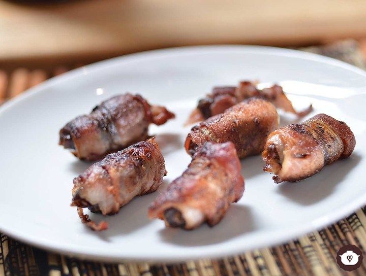 Dátiles rellenos de almendra con tocino