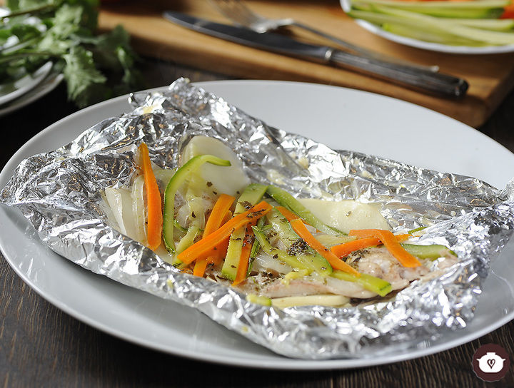 Pescado empapelado con papas sin horno