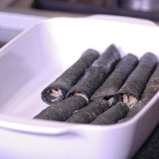 Enrollar cada enchilada y colocar en una fuente para horno. S 13879 1475615400