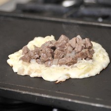 Agregar un poco de carne encima.