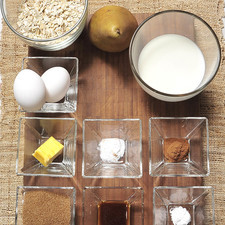 ¾ tazas de leche 2 huevos 1 cucharada extracto de vainilla ¼ taza de azúcar morena 1 taza de avena ½ cucharita canela en polvo ¼ cucharadita cardamomo ½ cucharadita polvo para hornear 3 duraznos 1 trozo de mantequilla S 3771 1475630223